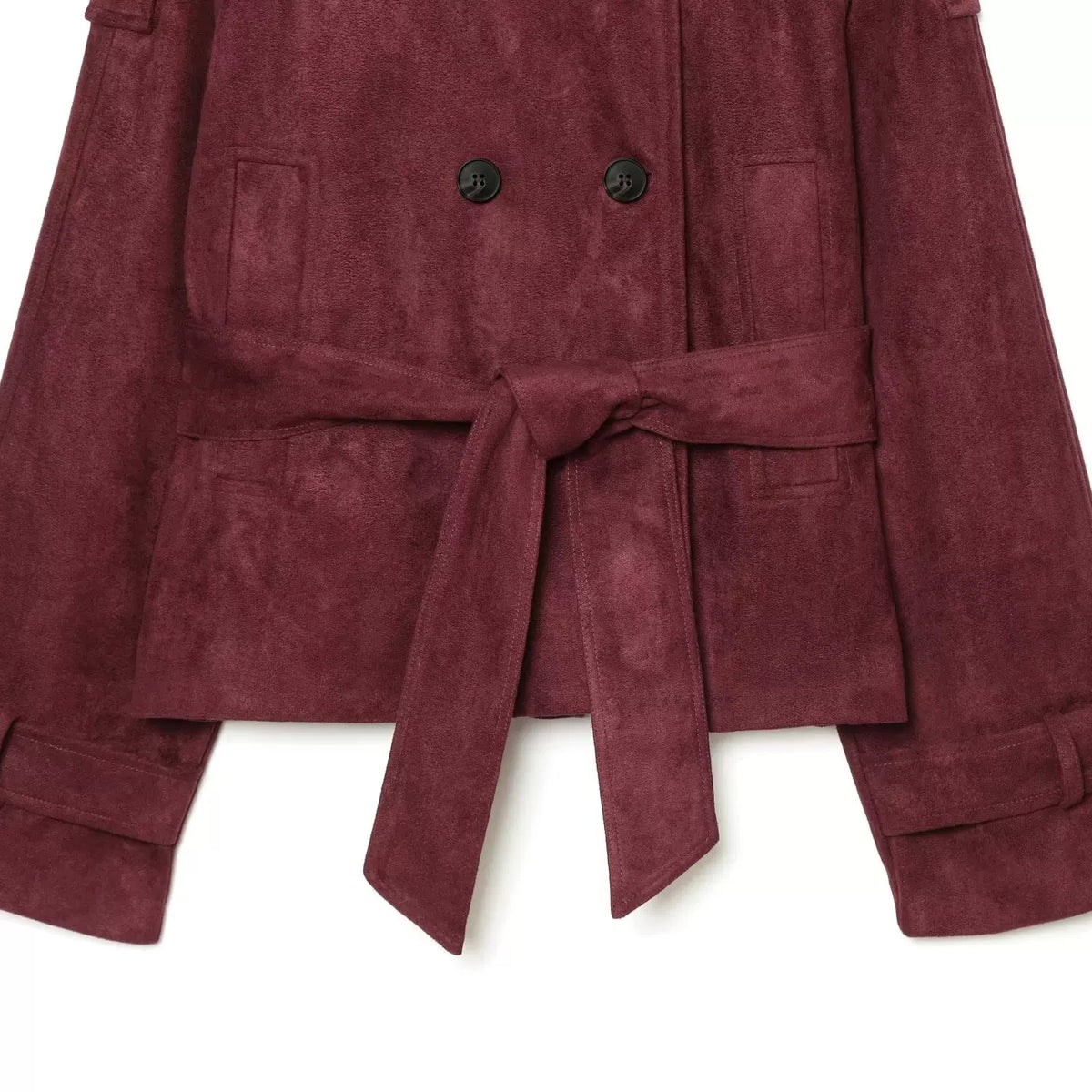 Double-breasted front, pockets and tie belt, close-up