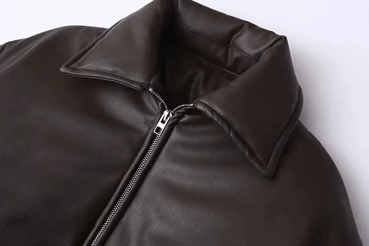 Point collar and zip, close-up