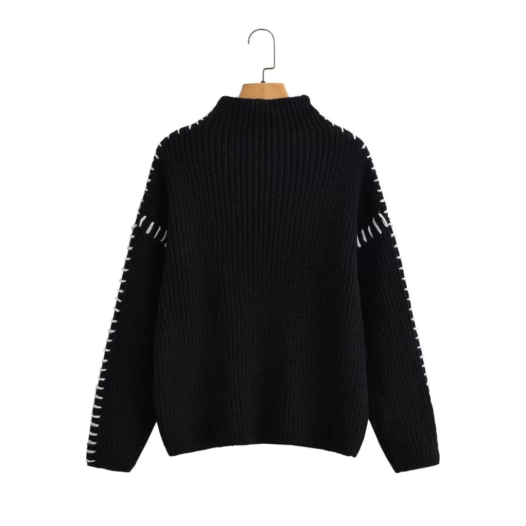 Black chunky knit jumper with contrast stitching, front view