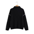 Black chunky knit jumper with contrast stitching, front view