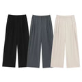 Wide-leg trousers in black, grey and beige
