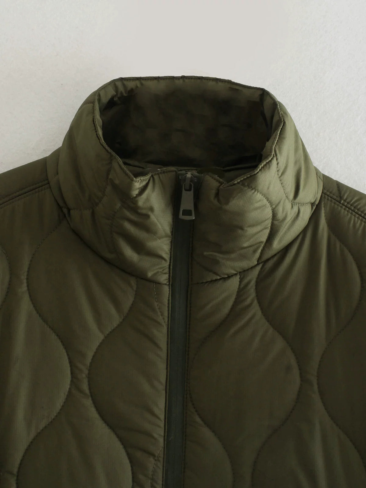 Stand collar and half zip, close-up