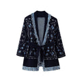 Navy paisley knit jacket with fringe trim and tie belt, front view