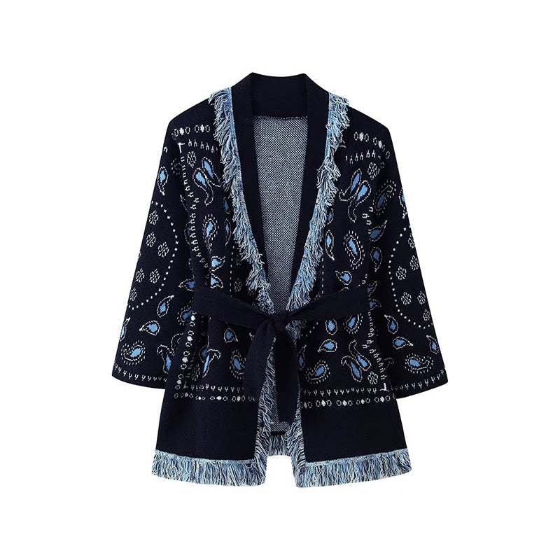 Navy paisley knit jacket with fringe trim and tie belt, front view