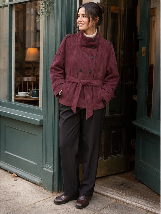 Burgundy faux suede jacket styled on a model (AI-generated image)