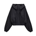 Black hooded cropped windbreaker jacket, front view